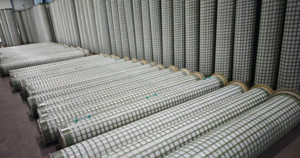 Chlorine gas mist removal system using fiber bed mist eliminator