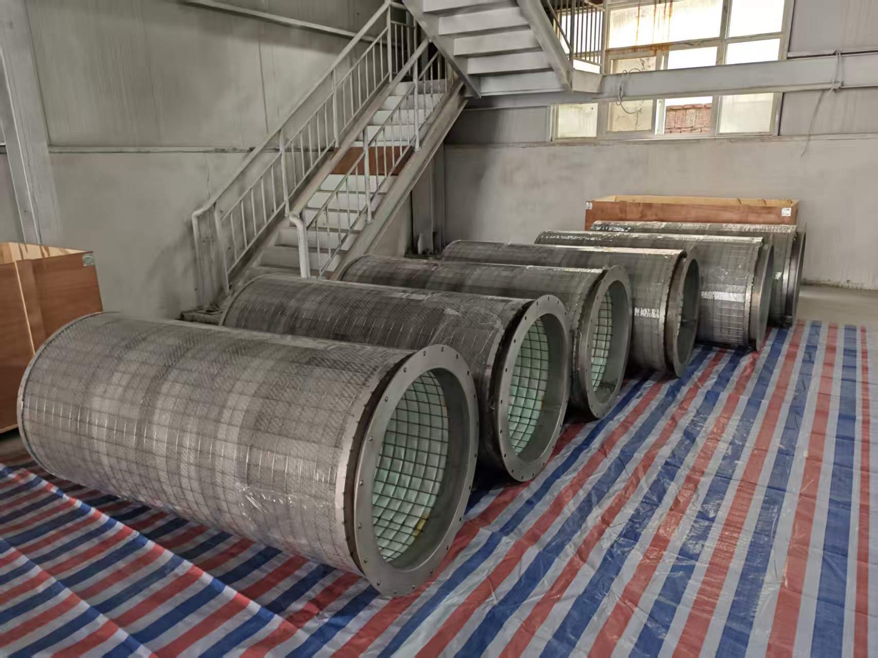 Fiber bed sulfuric acid mist eliminator for acid plant