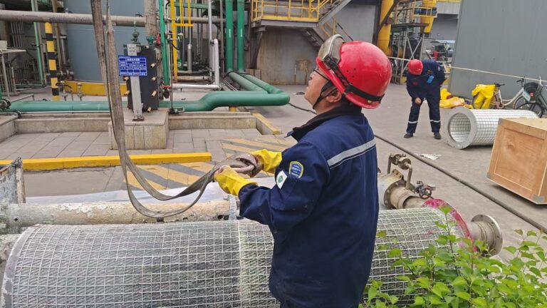 Fiber bed sulfuric acid mist eliminator for acid plant